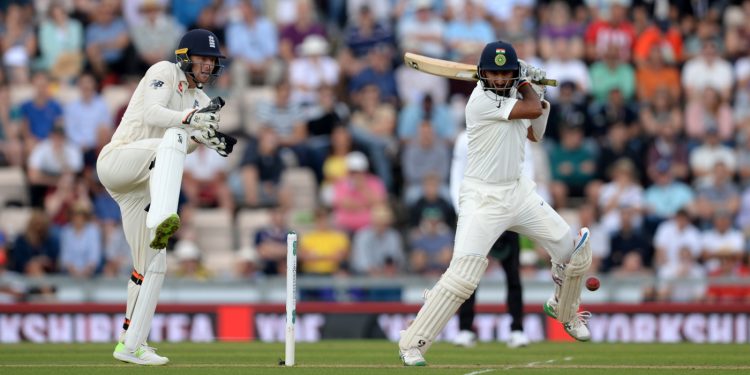 Cheteshwar Pujara plays a shot against England