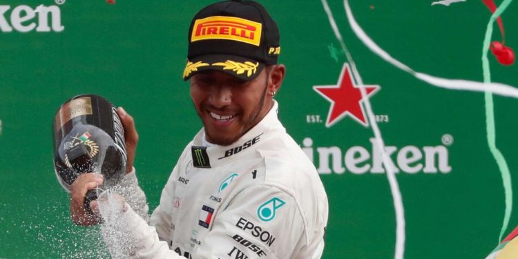 Lewis Hamilton sprays champagne after his Italian GP win, Sunday