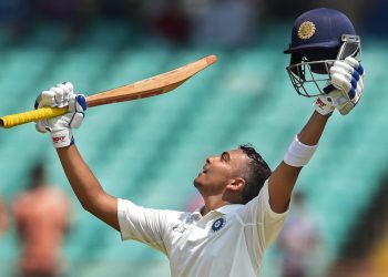 Prithvi Shaw celebrates his century against West Indies, in Rajkot, Thursday