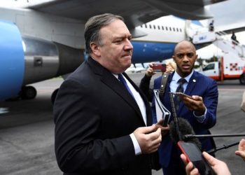 U.S. Secretary of State Mike Pompeo speaks to reporters before boarding his plane at the Mexico.