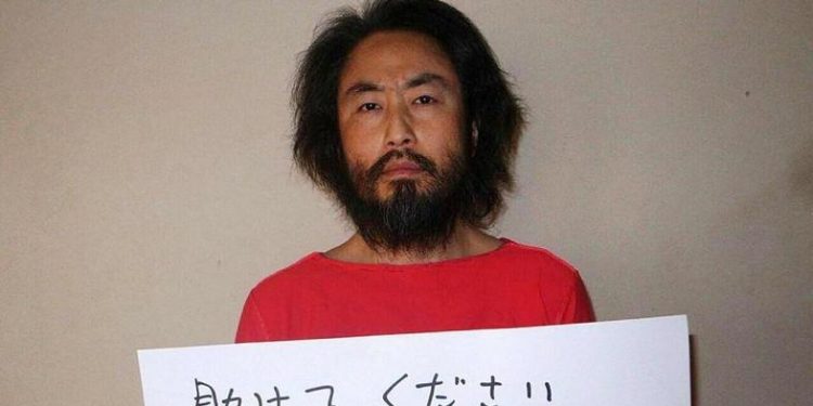 Japanese journalist Jumpei Yasuda held in Syria returns home.