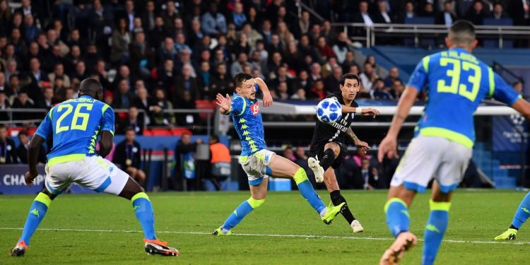 Angel Di Maria (in black) strikes the curler in the stoppage time to salvage a point for PSG as Napoli defenders look hapless, Wednesday