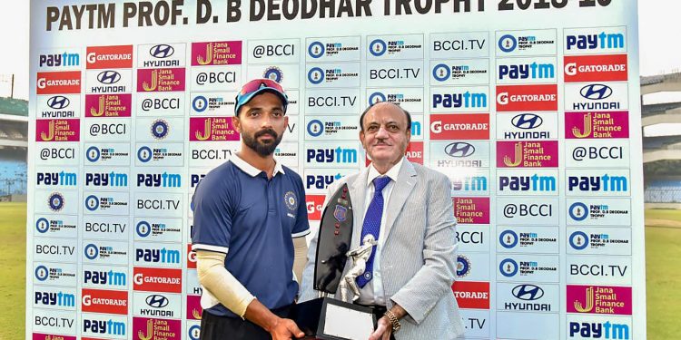 India C captain Ajinkya Rahane receives the winners’ Trophy from BCCI acting president CK Khanna in New Delhi, Saturday  