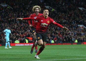 Alexis Sanchez celebrates after scoring the winner against Newcastle United at Old Trafford