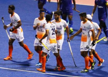 Indian players celebrate after scoring a goal against Malaysia at Johor Bahru, Saturday