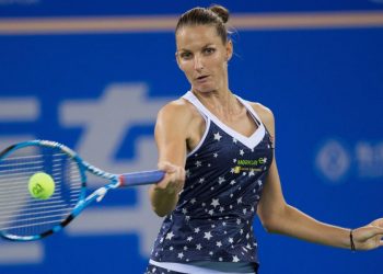 Karolina Pliskova plays a shot against Caroline Wozniacki in Singapore, Sunday