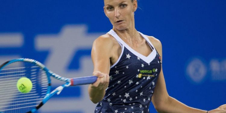 Karolina Pliskova plays a shot against Caroline Wozniacki in Singapore, Sunday