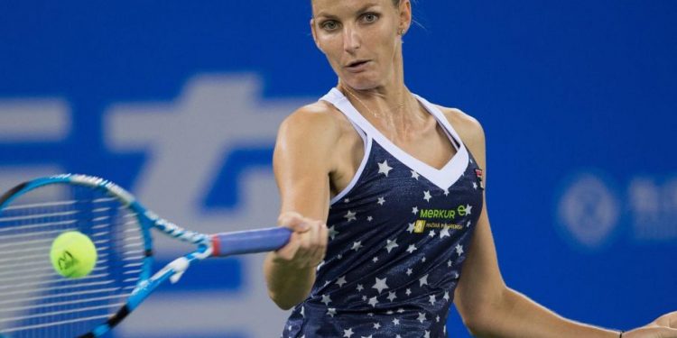 Karolina Pliskova plays a shot against Caroline Wozniacki in Singapore, Sunday