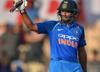 Indian batsman Ambati Rayudu celebrates his century against West Indies at Brabourne Stadium, in Mumbai, Monday