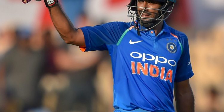 Indian batsman Ambati Rayudu celebrates his century against West Indies at Brabourne Stadium, in Mumbai, Monday