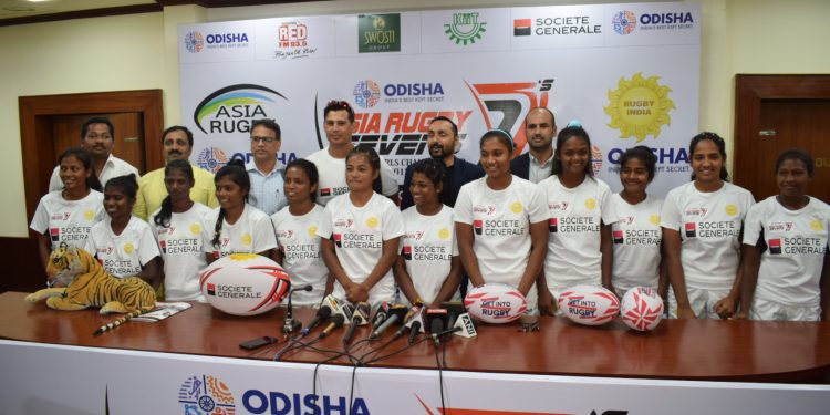 India team players along with other officials pose for a photograph during the press meet at Kalinga Stadium in Bhubaneswar, Thursday     