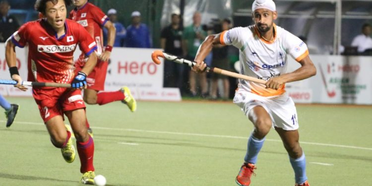 Mandeep Singh who scored a hat-trick in action against Japan Sunday night                    