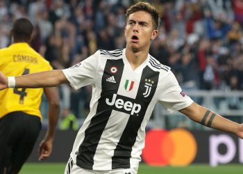 Paulo Dybala celebrates after scoring one of his three goals against Young Boys in Turin, Wednesday