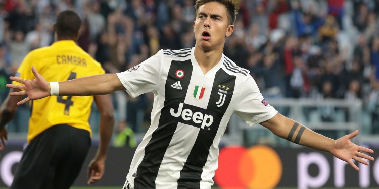 Paulo Dybala celebrates after scoring one of his three goals against Young Boys in Turin, Wednesday