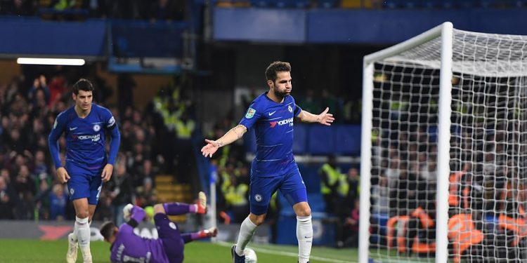 Cesc Fabregas celebrates after scoring the winning goal against Derby County in London, Wednesday