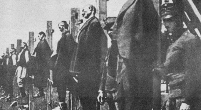 Civilians near the Austrian lines in Serbia are strung up – probably as a reprisal for guerrilla resistance to the invaders