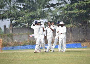 Shivam Mavi (C) celebrates with UP teammates after dismissing an Odisha batsman, Wednesday