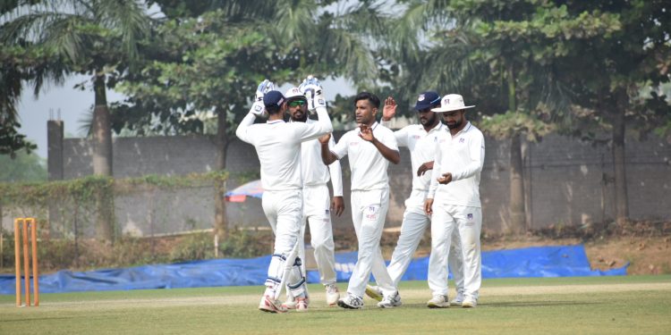 Shivam Mavi (C) celebrates with UP teammates after dismissing an Odisha batsman, Wednesday