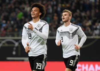 Leroy Sane celebrates Germany’s opening goal as Timo Werner (R) runs to join in against Russia, Thursday