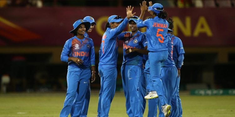 Indian players celebrate after dismissing an England batswoman during their second warm-up match, Wednesday
