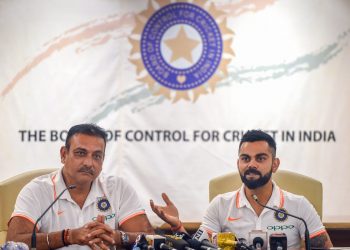 India head coach Ravi Shastri (L) and captain Virat Kohli address media persons in Mumbai Thursday before their departure for the Australia tour   