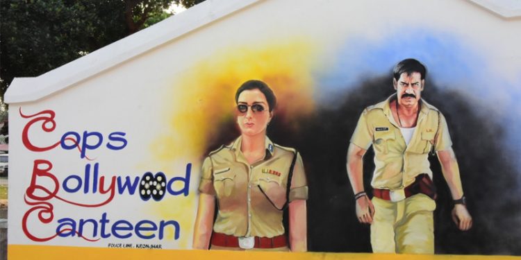 Life size paintings of Bollywood’s iconic cops adorn this open air canteen