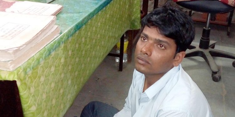 Man held for defrauding