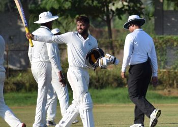 Haryana’s Himanshu Rana is all smiles while celebrating his century against Odisha at KIIT Stadium in Bhubaneswar, Friday 