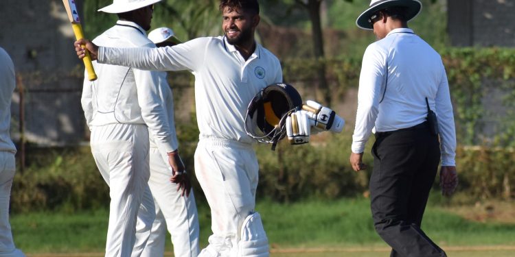 Haryana’s Himanshu Rana is all smiles while celebrating his century against Odisha at KIIT Stadium in Bhubaneswar, Friday 