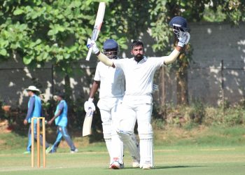 Anurag Sarangi celebrates his century