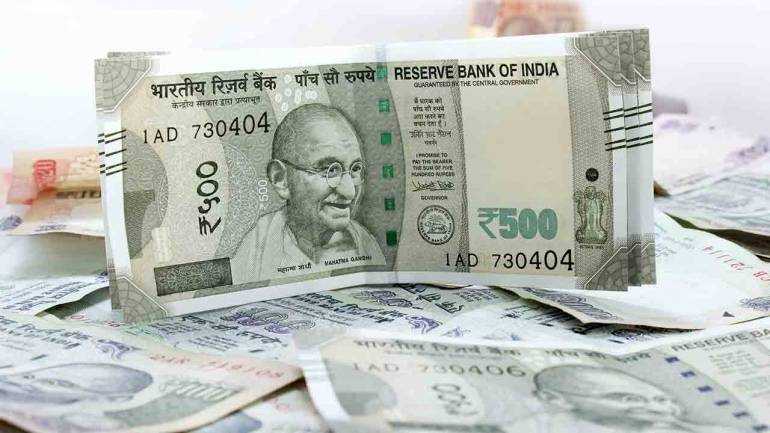 Rupee rises 11 paise to 69.80 vs USD in early trade