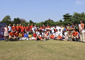 England players and officials with students of Sai International School in Bhubaneswar, Wednesday