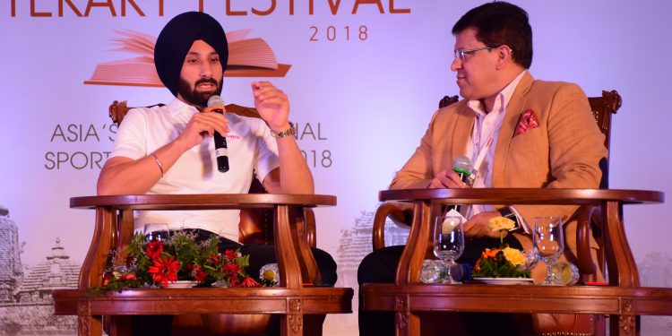 Sardar Singh interacts with moderator Arup Ghosh at ESLF, Saturday