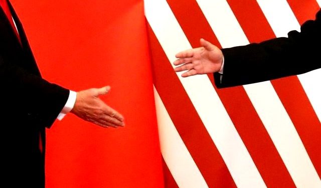 FILE PHOTO - U.S. President Donald Trump and China's President Xi Jinping shake hands after making joint statements at the Great Hall of the People in Beijing, China, November 9, 2017. (REUTERS)