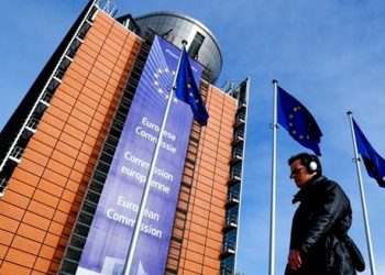 European Union flags flutter outside the EU Commission headquarters in Brussels, Belgium, March 12, 2018. (REUTERS)