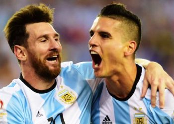 Tottenham's Erik Lamela and Messi