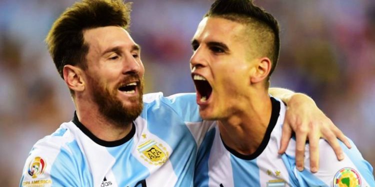 Tottenham's Erik Lamela and Messi