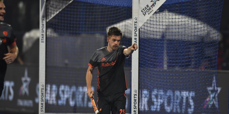 Thierry Brinkman celebrates after scoring against Canada