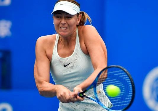 Five-time Grand Slam champion Maria Sharapova returning Timea Bacsinszky at the Shenzhen Open.