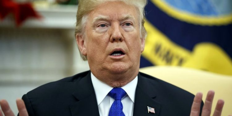 In this Dec. 11, 2018 photo, President Donald Trump speaks during a meets with Democratic leaders the Oval Office in Washington. Against the advice of many in his own administration, Trump is pulling U.S. troops out of Syria. But the abruptness with which Trump is turning the page on Syria is raising questions about whether he might not do the same in Iraq or Afghanistan. (AP)