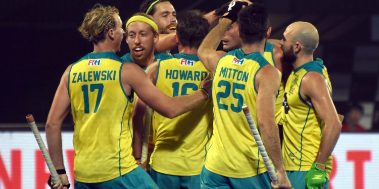 Tim Brand (R) and Jeremy Heyward congrats rejoice after a goal from the former against China