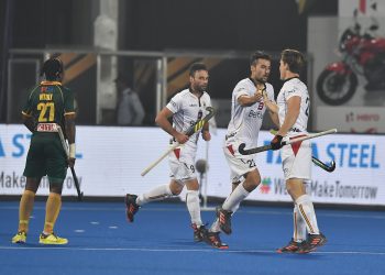 Belgium players celebrate after Simon Gougnard’s (C) goal against South Africa at Kalinga Stadium, Saturday