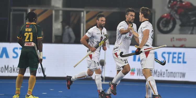Belgium players celebrate after Simon Gougnard’s (C) goal against South Africa at Kalinga Stadium, Saturday