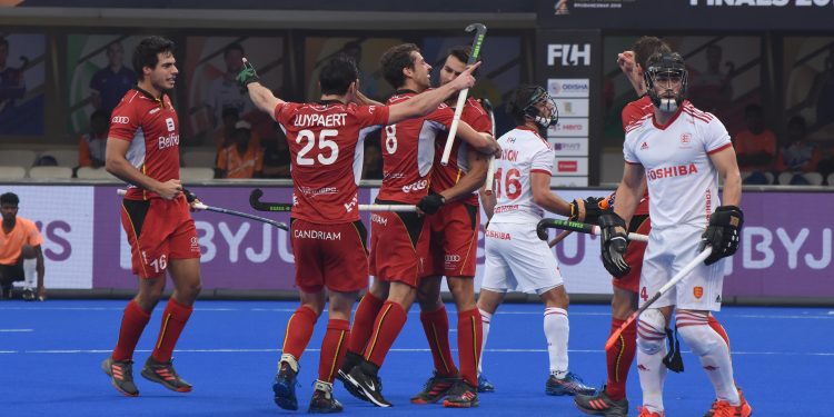 Belgium players celebrate one of their goals against England at the Kalinga Stadium