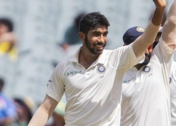 Caption
Jasprit Bumrah shows the ball after taking his career-best figures at MCG, Friday