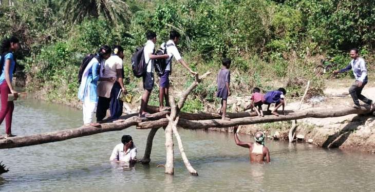 Determined for education, students cross river dangerously to reach school