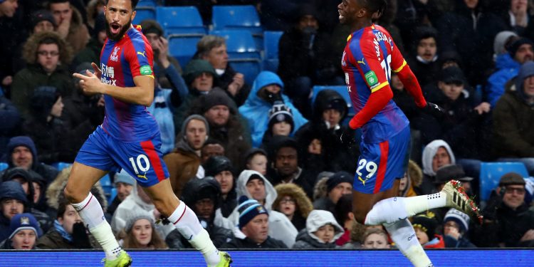 Andros Townsend (L) wheels away in celebration after scoring the winner for Crystal Palace against Man City, Saturday
