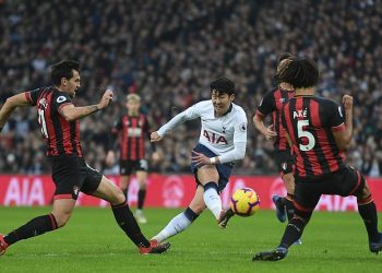 Son Heung-min (in white) strikes powerfully for his second goal against Bournemouth at Wembley, Wednesday