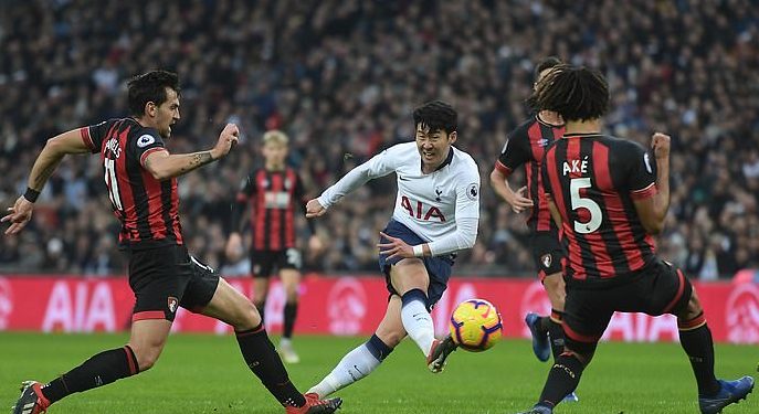Son Heung-min (in white) strikes powerfully for his second goal against Bournemouth at Wembley, Wednesday