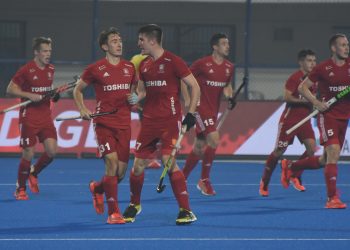 England players celebrate after scoring against Ireland at Kalinga Stadium, Friday
